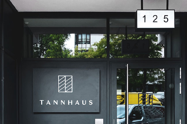 Tannhaus lightbox suspended and mounted on the wall of the house